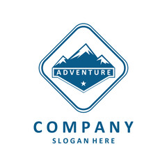 the mountain and adventure logo is blue on a white background