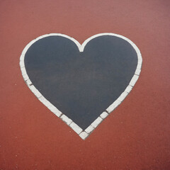 Heart on the asphalt.