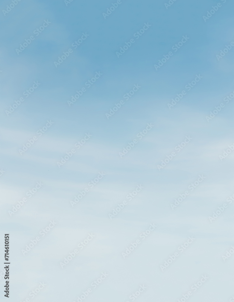 Wall mural tranquil light blue sky background.