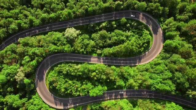 Aerial summer view of a winding mountain road forming an S-shape
