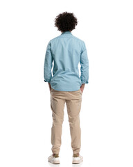 back view of relaxed young man with curly hair