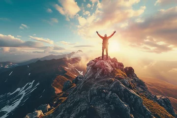 Foto op Aluminium Positive man celebrating on mountain top, with arms raised up © Huong