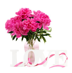 Pink peony flowers in vase