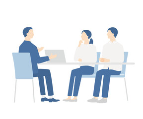 相談する若い夫婦と男性プランナー