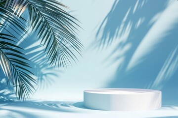 Fototapeta na wymiar Abstract blue background with white podiums and tropical palm leaves with shadows