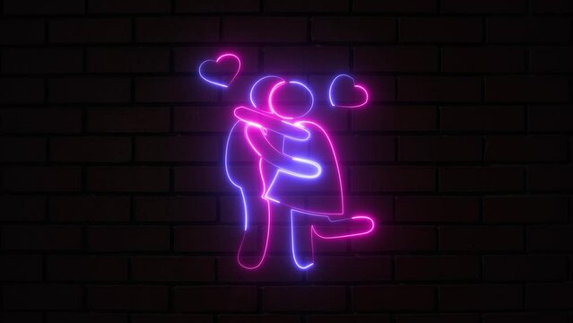 Glowing neon romantic couple with shaved head kissing on mouth on brick wall. Concepts of emotions, love, relations, and romantic holidays. Silhouettes and illumination on a brick wall background