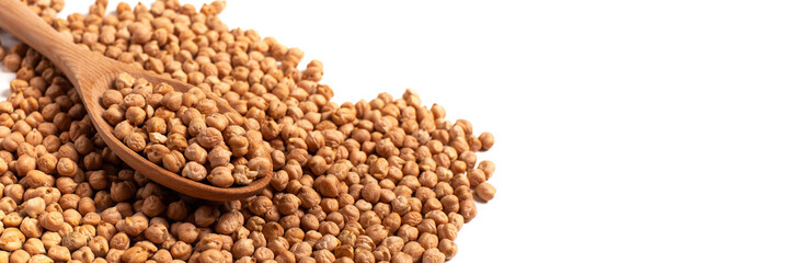 Dry organic chickpeas isolated on white background with copy space. Banner. Top view. 