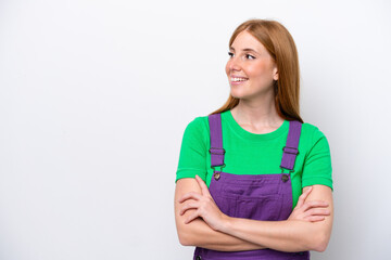 Young redhead woman isolated on white background happy and smiling