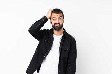 Young man with beard over isolated white background with an expression of frustration and not understanding