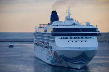 Modern family cruiseship or cruise ship liner Spirit arrival into Valletta port on Malta summer...