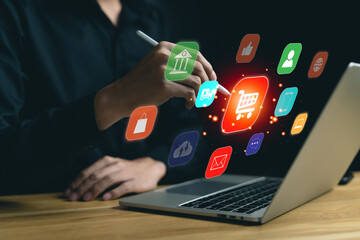 Online shopping on smartphone application technology. Man happy and touching on virtual app screen with computer laptop. Choose products, payment, sell products, purchase on the internet at home