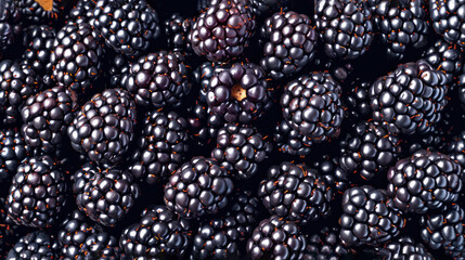  a pile of blackberries sitting next to each other on top of a pile of blackberries on top of a pile of blackberries on top of blackberries.