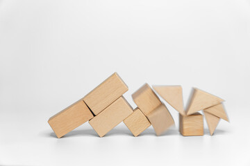 building wood blocks on white background; business or creative concept