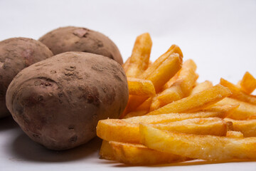 fresh potatoes and fried French fries