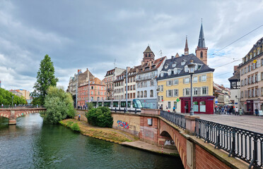 Fototapeta na wymiar Le Petite France, the most picturesque district of old Strasbourg. Houses along the Ill River channel.