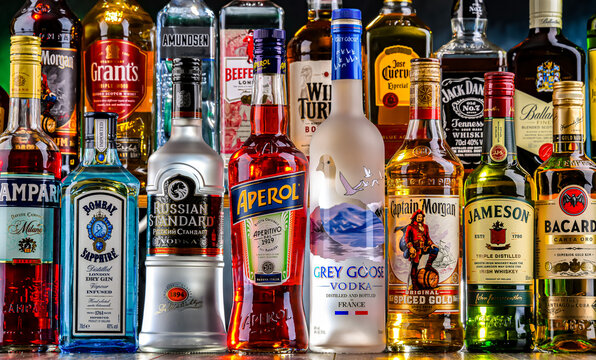 Bottles of assorted global hard  liquor brands in a bar