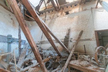 Decay and Abandonment - View of the interior of a house that is destroyed and abandoned