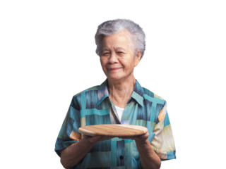 An elderly Asian woman holding a wooden tray and looking at the camera with a smile while standing on a transparent background.