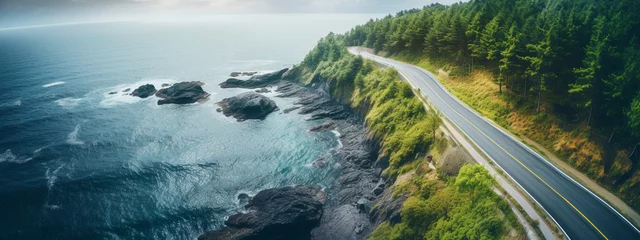 Tuinposter top view of a beautiful road near the ocean © Артур Комис