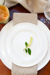 Decoration of wedding table with flowers in botanical style