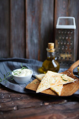 Focaccia with olive oil, cheese, white sause and herbs