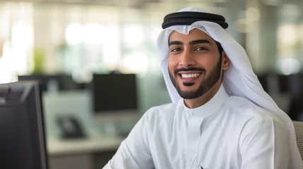 Foto op Plexiglas Happy Emirati Arab at office wearing kandura looking at front ideal for Middle East business concept . © Hope