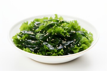 Fresh Seaweed Salad with Sesame Seeds in a White Bowl