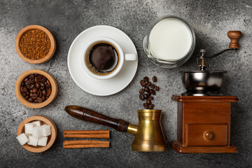Ingredients for making coffee. Different ways to make coffee geyser moka maker,turkish coffee pots (cezve). Coffee making concept with milk, cinnamon and star anise. Flat Lay. Top view. Copy space