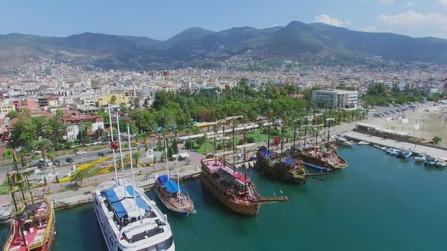 Cityscape with touristic vessels in Alania Sea Port 
