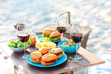 Picnic table with red wine glasses