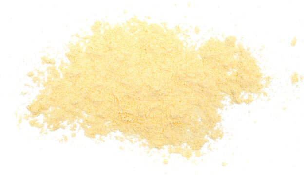 Corn flour pile scattered isolated on white
