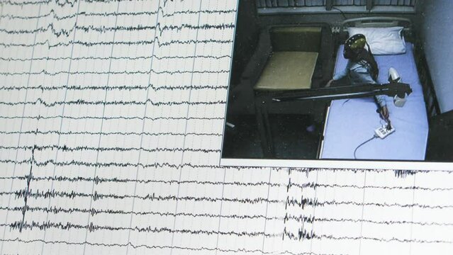 On screen is results of neuroscope and video with the sleeping girl