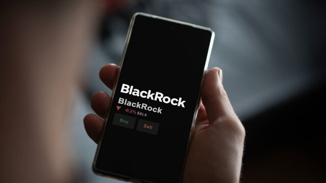 BlackRock on the screen of an exchange. BlackRock price stocks, $BLK on a device.