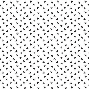 Hand drawn heart seamless pattern. Doodle hipster simple background about love for Valentines day. Trendy simple texture with tiny little hearts. 