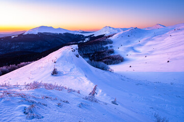 Winter sunset in the mountains. Bieszczady National Park, Poland.