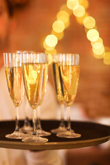 Champagne glasses on tray. Party and event concept