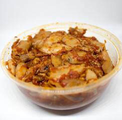 Pinrang, South Sulawesi Indonesia.
Stir-fried baby squid stored in a jar on a white background.
January 21 2024