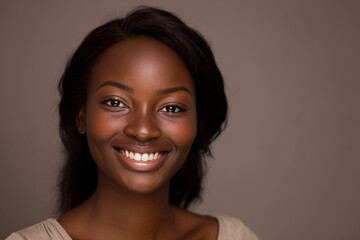 Fototapeta premium A woman with dark hair is smiling for the camera
