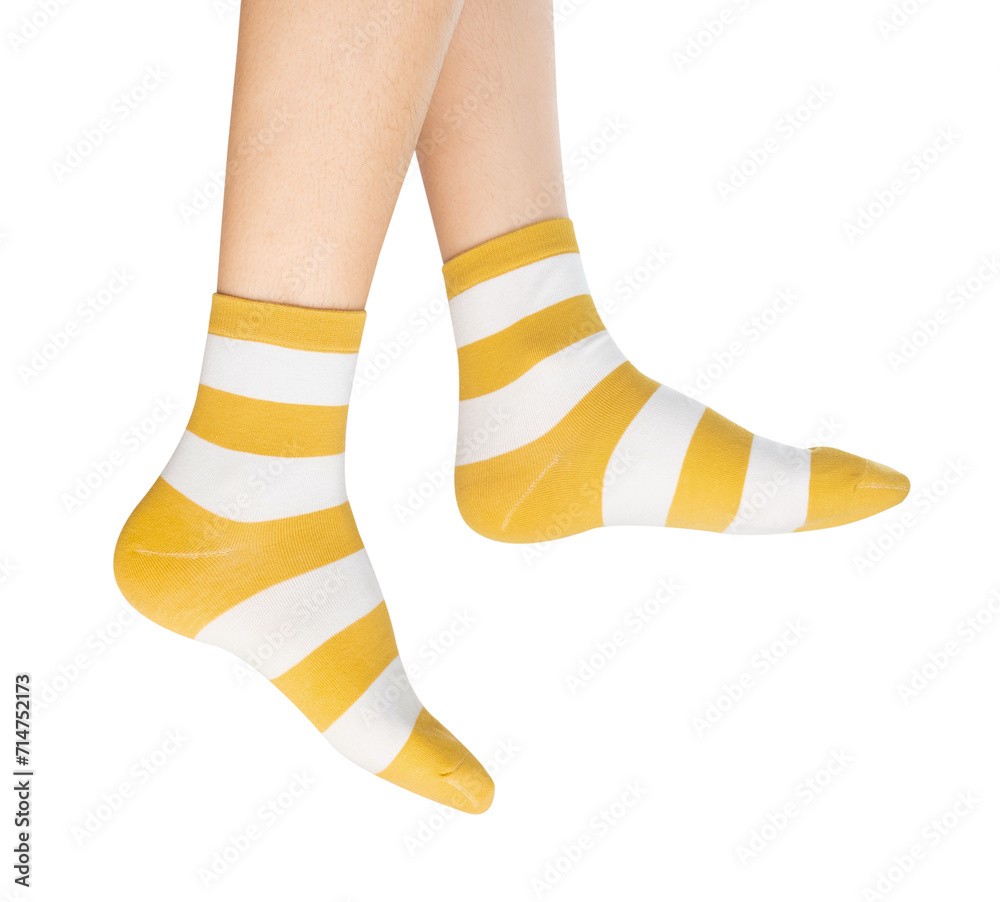 Wall mural Woman wearing colorful socks on isolated white background.