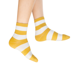 Woman wearing colorful socks on isolated white background.