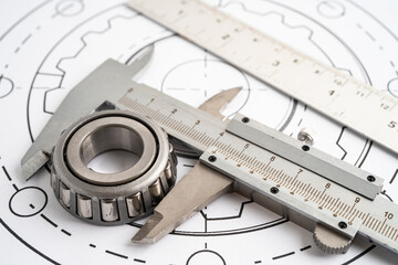 Engineering tools and mechanical industrial with vernier caliper and metal ball bering.