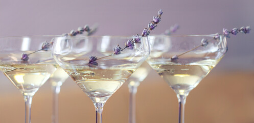 Glasses of champagne decorated with lavender