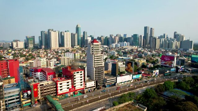 Metro Manila, Philippines - April 2023: Aerial of EDSA and Guadalupe, Makati. The BGC skyline in the back of the photo.