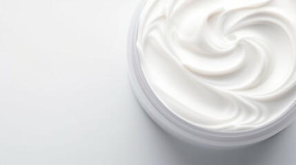 Close up jar of white cream skin care or hair care on white background. Top view, flat lay. Texture, product, advertising, text, oranic cosmetics
