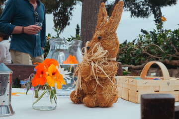Beautiful table setting with Easter rabbit and eggs.