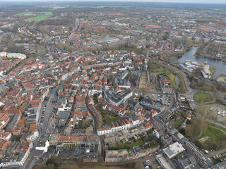 Aerial overview of the city of Zutphen, along the river Ijssel in Gelderland, The Netherlands. Birds eye aerial drone view in the Dutch province of Gelderland.