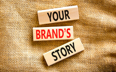 Branding and your brand story symbol. Concept words Your brands story on beautiful wooden blocks. Beautiful canvas table canvas background. Business branding your brand story concept. Copy space.