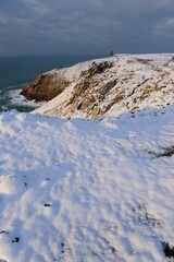 Jersey, U.K. Les Landes with dramatic snowy coastline.