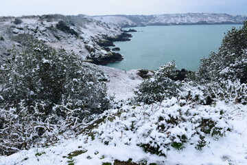 Jersey,U.K. Boulay Bay and the North coast with snow.