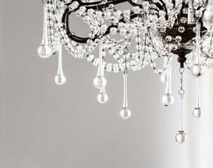 Obraz premium Contemporary crystal chandelier in room interior